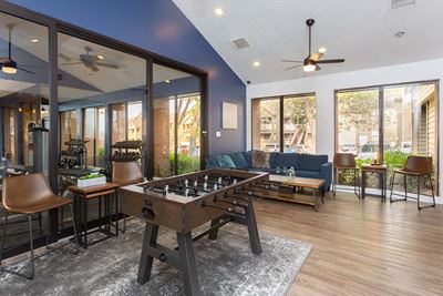 Clubhouse with game area l Mountain Run Apartments